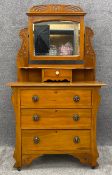 A late 19th century satin walnut dressing table with Art Nouveau carved motifs. H.164 W.93 D.44cm