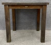A contemporary weathered Chic Teak garden table with maker's label. H.76 W.80 D.80cm