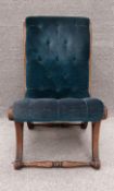 A 19th century style mahogany framed slipper nursing chair. H.79cm