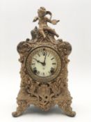 A late 19th century Rococo style brass cased mantle clock by the Ansonia Clock Company. H.32cm.