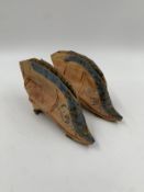 A pair of Chinese 19th century silk embroidered lotus shoes L.18cm (each)