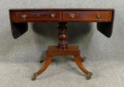 A Regency mahogany and ebony strung sofa table. H.72 W.91 (146 extended) D.59cm