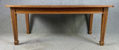 A C.1900 carved oak refectory style dining table. H.75 W.183 D.107cm