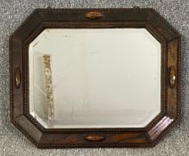 A mid century oak framed wall mirror. H.49 W.58cm