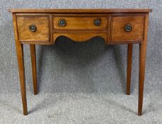 A 19th century mahogany side table fitted with frieze drawers on square tapering supports. H.71 W.85