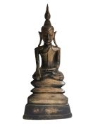 A brass figure; seated Buddha. H.33.5 W.15.5 D.5.5cm.