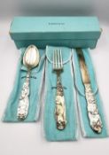 A Tiffany & Co. silver boxed nursery rhyme cutlery set, consisting of a knife, fork and spoon.