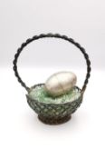 Janna Thomas for Cartier, silver egg in a silver Tiffany basket, egg 5cm X 3.5cm, basket H.12CM 97g