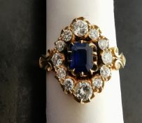 A boxed Victorian style vintage 18 carat yellow gold diamond and sapphire marquise cluster ring, set