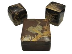 Two Japanese boxes and a kogo (four-tiered incense holder), lacquered wood with metal inset and