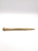 A gold propelling pencil marked 9ct 14.62g gross
