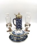 A Taylor, Tunnicciffe & Co. porcelain beer stein with a silver plated lid and Oriental style