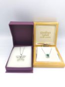 Two silver necklaces, longest 45cm, a butterfly pendant and an emerald green stone both with