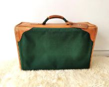 A green canvas Ventura suitcase with tan leather trim L.53 H.36 W.20cm.