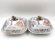 A pair of early 19th century Masons Ironstone covered tureens, hand painted with the Flying Bird