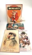 A collection of four metal advertising plaques, 1990's and a set of gift tags, Christmas themed.