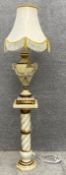 A contemporary floor standing ceramic lamp on stand with classical motifs, dated 2003, stamped