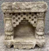 An antique carved stone Eastern temple fragment, altar piece or recess flanked by pilasters. H.25