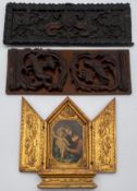 A finely carved 19th century panel, griffins and cherubs with scrolling foliate design, a carved