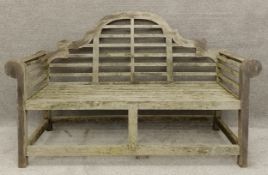 A Lutyens style teak garden bench. H.103 W.168 D.61cm