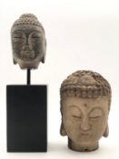 A vintage Chinese carved stone head of Buddha on plinth base and a carved hardwood similar. H.