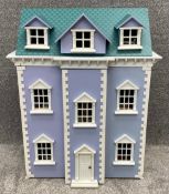 A contemporary doll's house, Georgian style and fully furnished. H.70 W.56 D.39cm