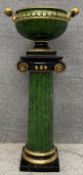 A contemporary ceramic jardiniere on stand with simulated green marbling and gilt embellishments