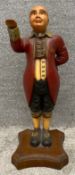 A vintage carved and painted wooden butler figure. H.67cm