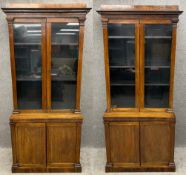A pair of mid 19th century rosewood library bookcases the upper glazed sections above bases with