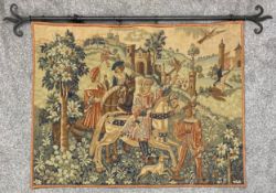 A medieval style wall hanging needlework tapestry with linen lining, a hunting scene on a cast