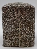 A C.1900 Ansonia Clock Co. Art Nouveau style gilt copper clock, in a fabric lined fitted embossed
