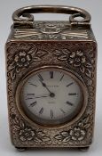 An early 20th century Mappin and Webb hallmarked silver carriage clock with winding key, marked