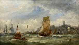William Lionel Wyllie (1851-1931), a signed and dated oil on canvas, sailing ships around a port,