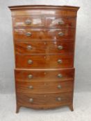 A late Georgian mahogany bow fronted two section chest on chest with satinwood string inlay raised
