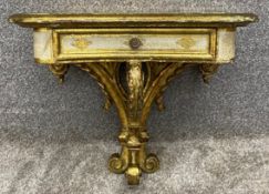 A vintage Florentine giltwood and painted console table. H.40 W.46cm