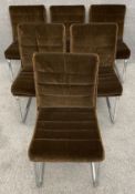 A set of seven mid century Verco dining chairs with original corduroy upholstery on chrome bases.