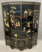 A vintage Chinese ebonised four panel privacy screen, inlaid with carved soapstone and mother of