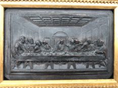 A small bronze relief panel; The Last Supper, gilt framed. H.18 W.23cm.