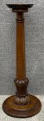 A 19th century acanthus carved mahogany jardiniere stand. H.103cm