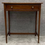 A 19th century mahogany side table fitted with frieze drawer raised on tapering supports. H.72 W.
