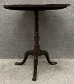 A 19th century mahogany tilt top tripod occasional table. H.72 Dia.70cm