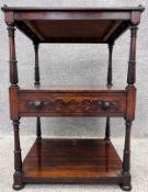 A William IV acanthus carved rosewood lamp or occasional table with undertier fitted with a