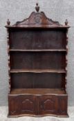 An 18th century French Provincial chestnut wall hanging open bookcase, H.123 W.68 D.21cm