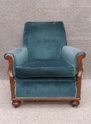 A C.1900 mahogany framed lounge armchair. H.82cm