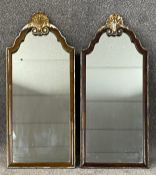 A pair of Georgian style wall mirrors with gilt shell cresting. H.72cm (each)
