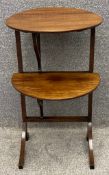 A C.1900 walnut folding occasional table or cakestand. H.75 Dia.45cm.