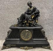 A 19th century mantle clock with classical figure surmount, possibly Aristotle, above a case with