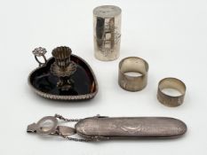 A miscellaneous collection of silver to include a silver and tortoiseshell heart-shaped