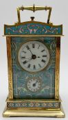 A 19th century brass carriage clock in an engraved and cloisonne enamelled case. With winding key.