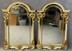 A pair of 19th century Italian style carved giltwood and painted wall mirrors. H.124 W.84cm (each)